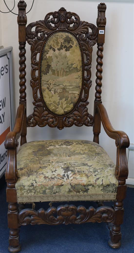 A pair of late 19th century German oak schloss chairs